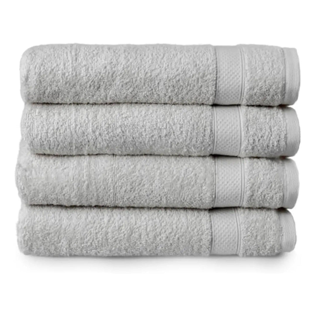 Set of 4 silver grey bath towels folded in a pile