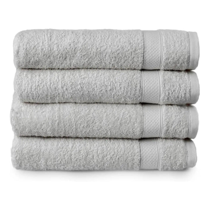 Set of 4 silver grey bath towels folded in a pile