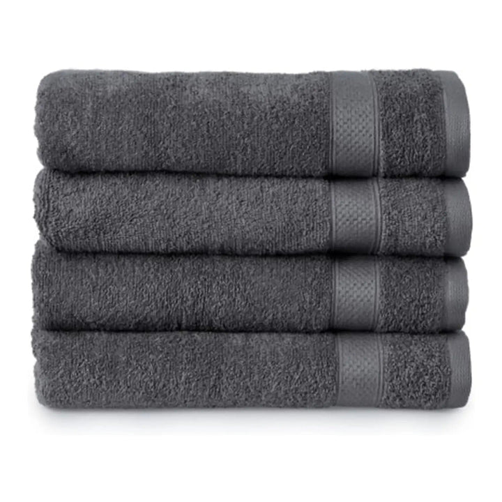 Set of 4 charcoal dark grey bath towels folded in a pile