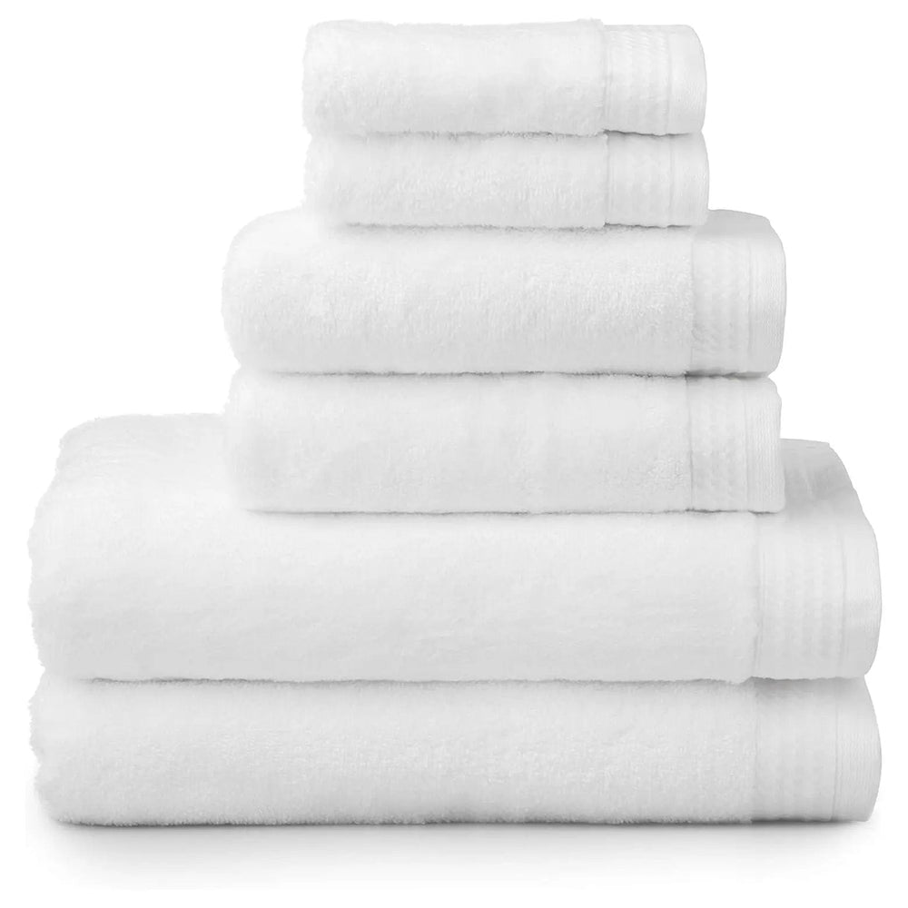 6 white towels folded in a pile with 2 bath towels, 2 hand towels and 2 face cloths