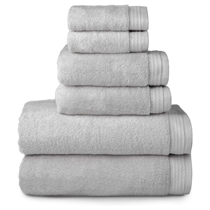 6 silver grey towels folded in a pile with 2 bath towels, 2 hand towels and 2 face cloths