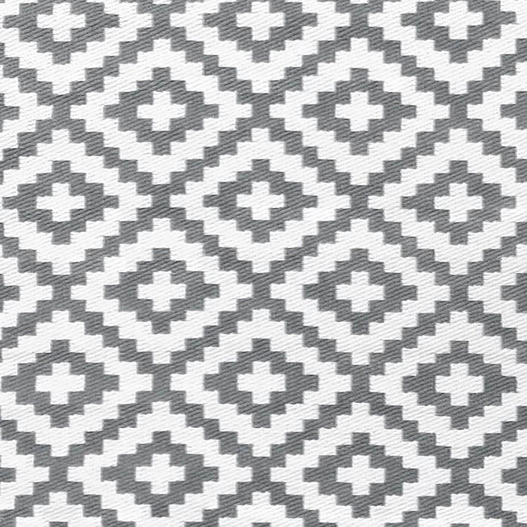 Grey and white diamond pattern woven plastic outdoor rug
