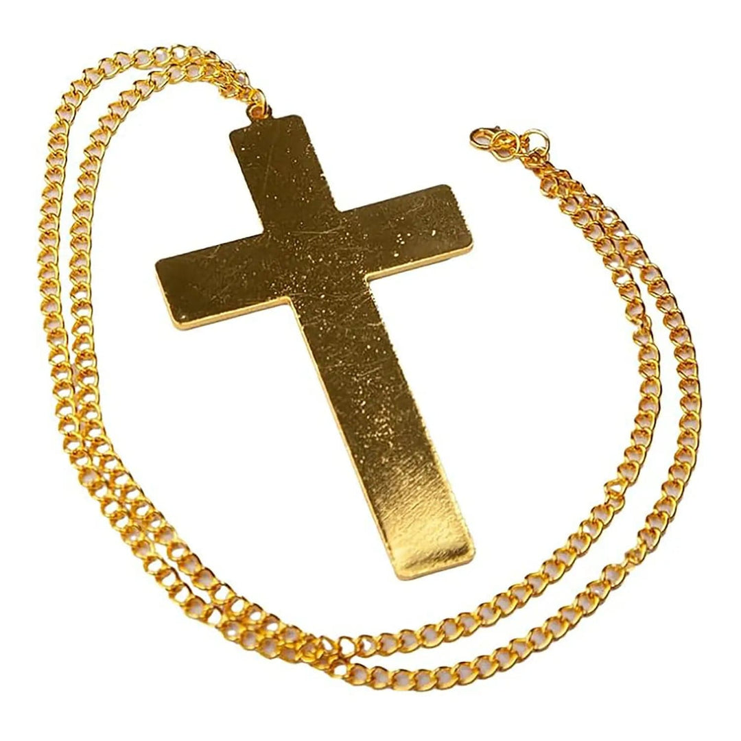 close up of a gold metal cross and chain link fancy dress accessory