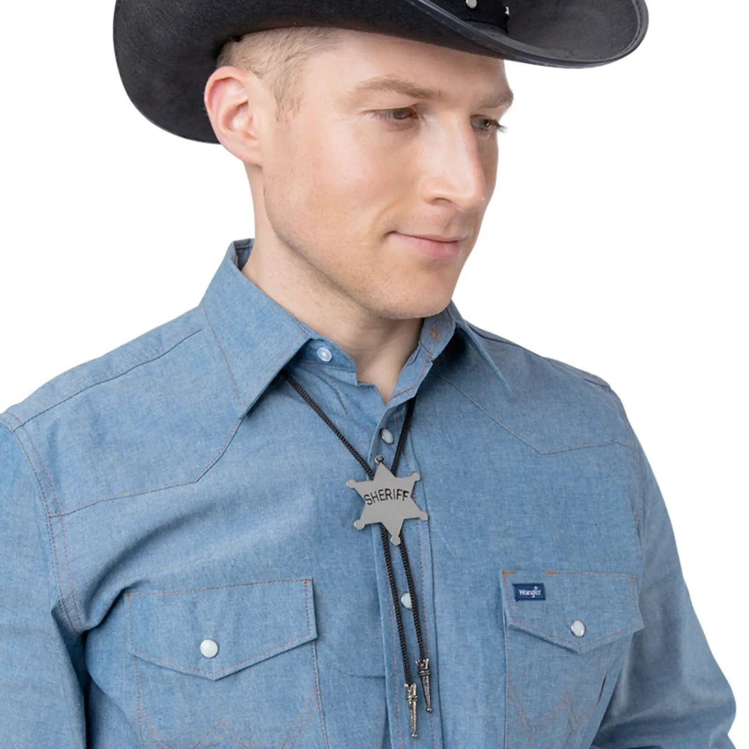 Man wearing a cowboy hat, blue shirt with bolo tie featuring a silver Sheriff star badge and black cord