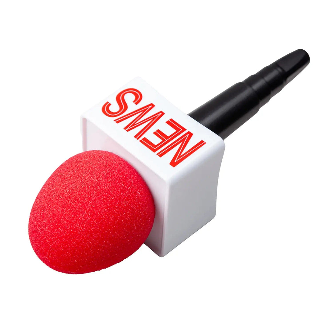 Close up of the red sponge top of a pretend microphone for a news reader fancy dress costume