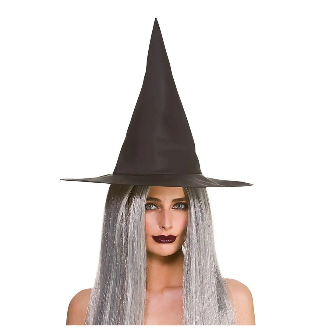 Woman with long grey hair wearing a big pointed witch hat for Halloween