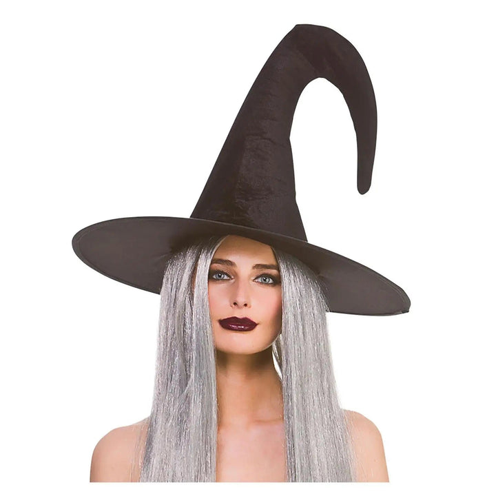 Woman with long grey straight hair wearing a black witch hat with bent tip for Halloween fancy dress costumes