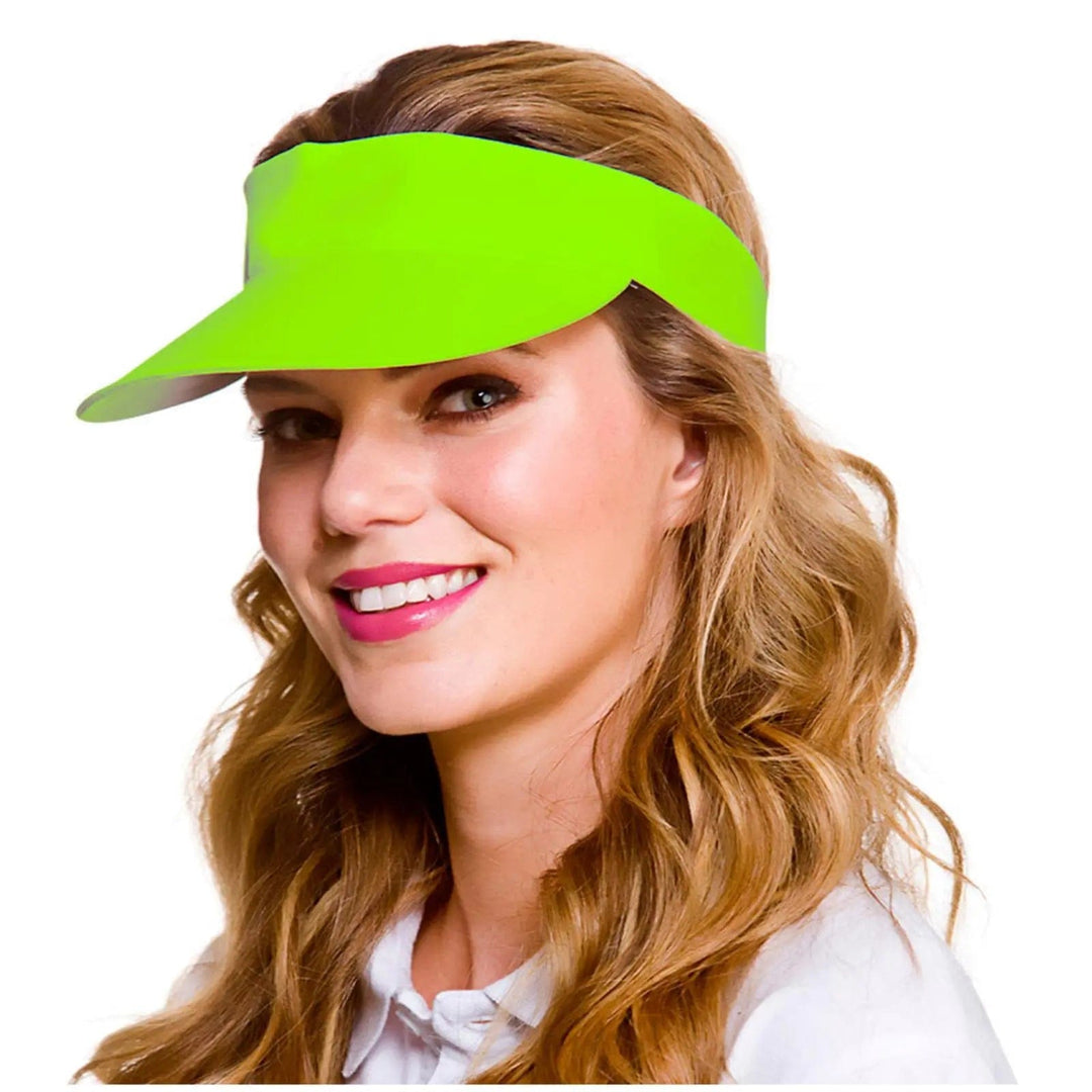 Young woman wearing a bright neon green sun visor fancy dress accessory