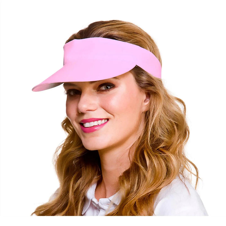 Young lady wearing a baby pink fabric golf visor for fancy dress parties and pub golf nights
