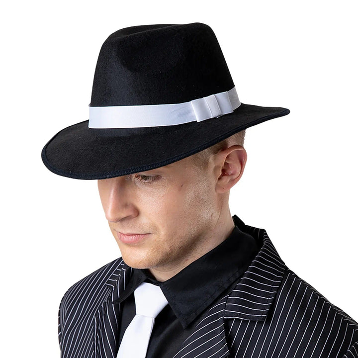 Man wearing a black fedora hat with white hatband for 1920s gangster fancy dress costumes