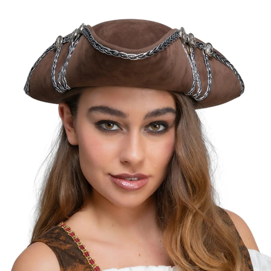 Lady wearing a brown tricorn pirate hat with silver buttons and braided trim