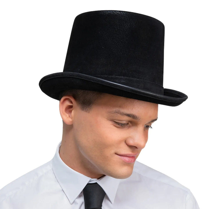 Man wearing a black velvet top hat for fancy dress costumes