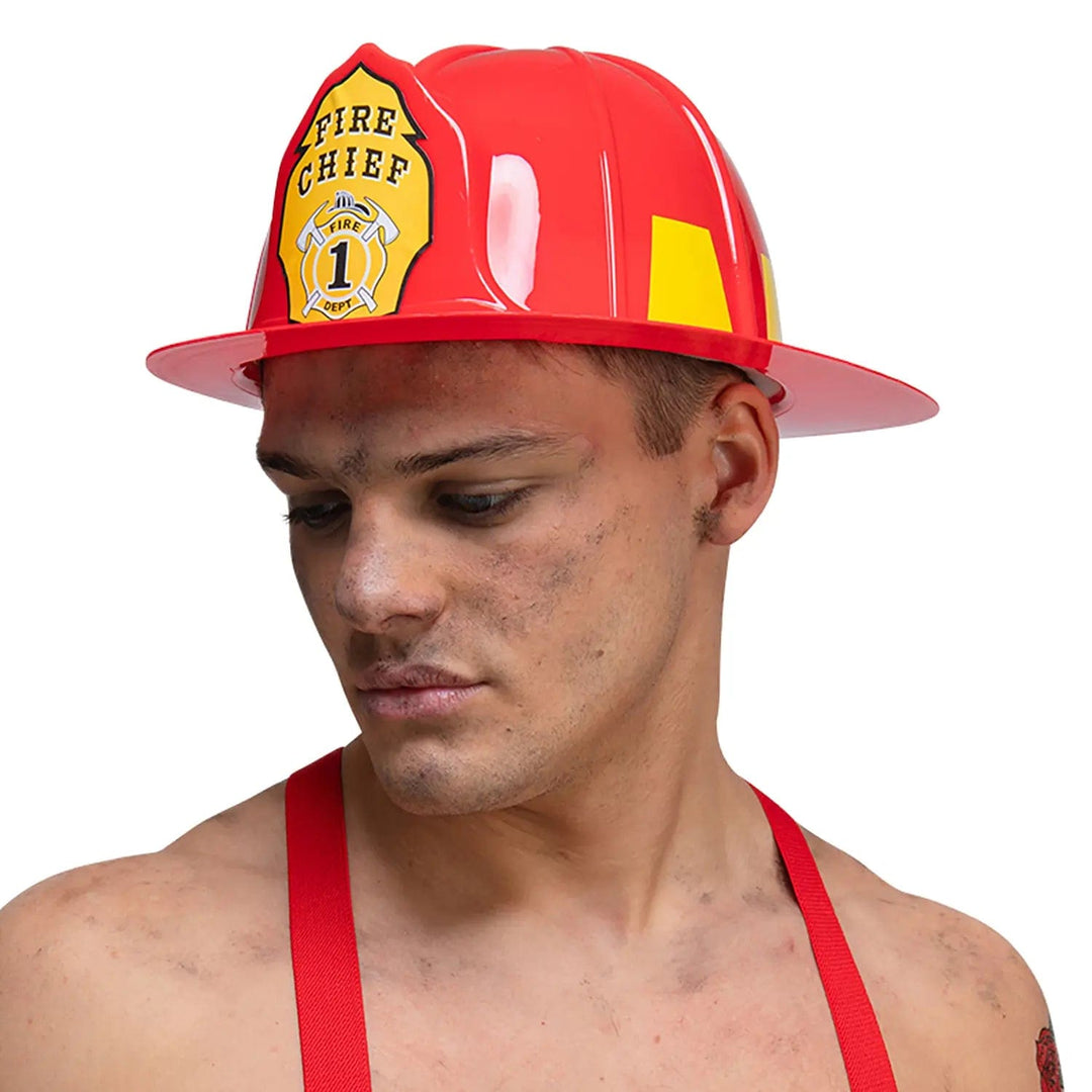 Male model wearing an american style fire chief helmet in red plastic