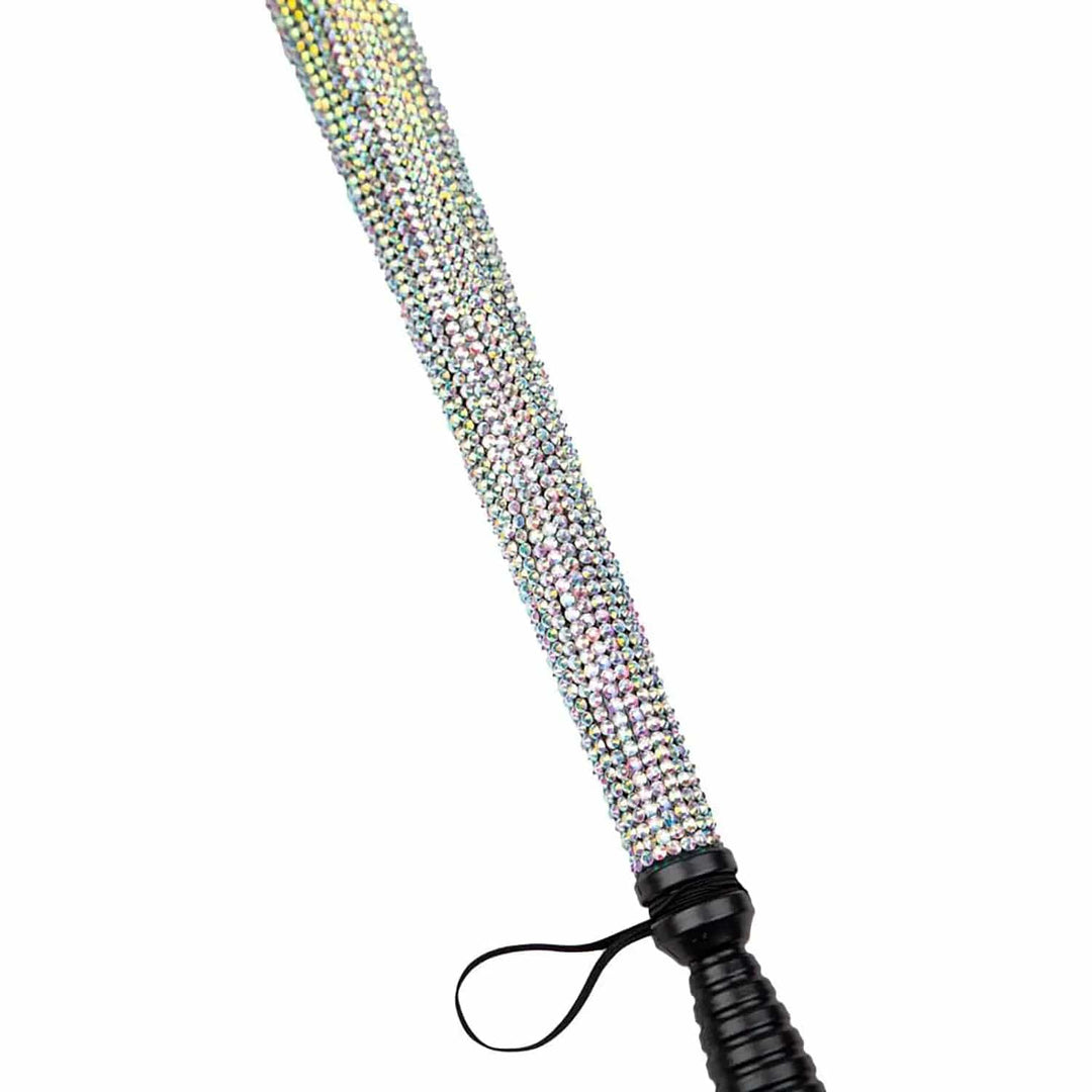 Close up of a Rhinestone police baton with wrist loop and black handle