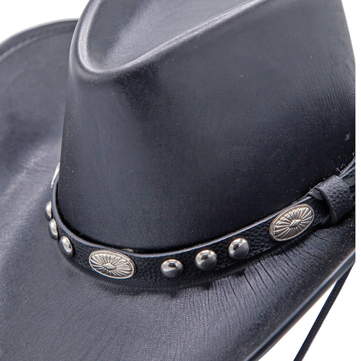 Close up of the silver studded band on a black faux leather cowboy hat