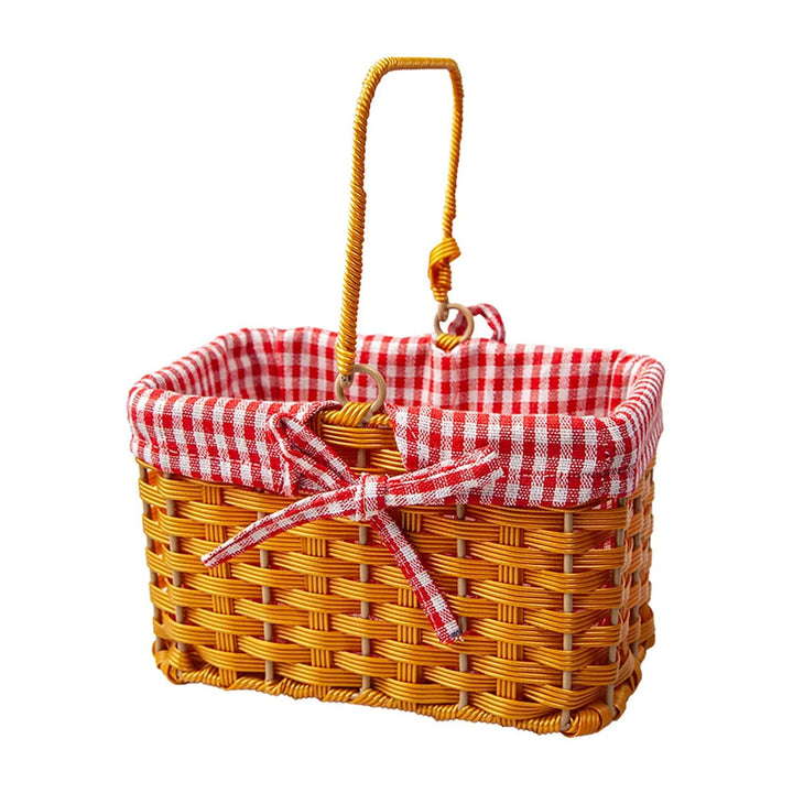 Wicker basket with handle and red and white gingham fabric pining