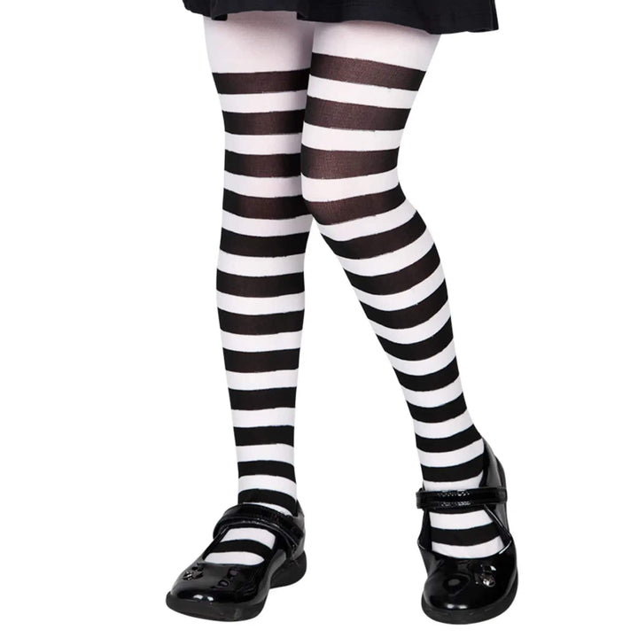 Child wearing black and white candy striped tights for fancy dress costumes