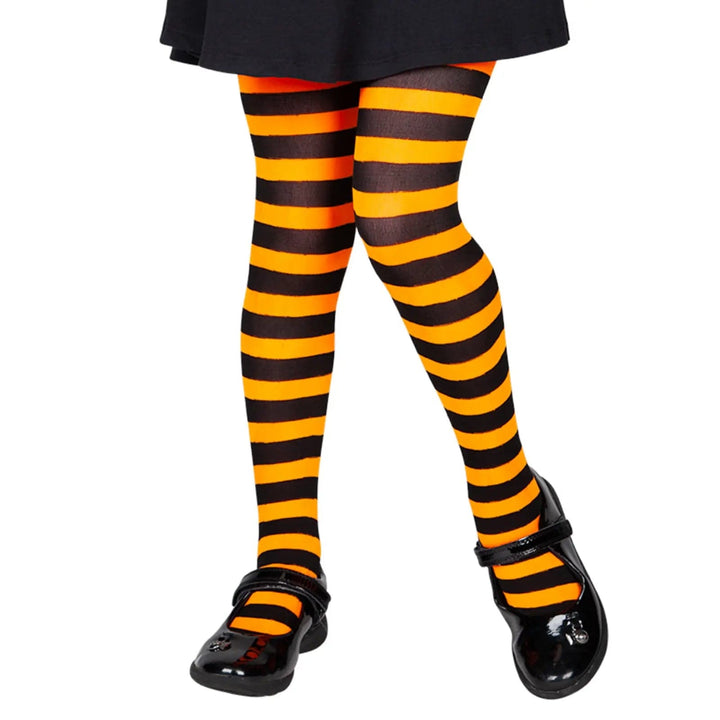 Child wearing black and orange candy striped tights for fancy dress costumes