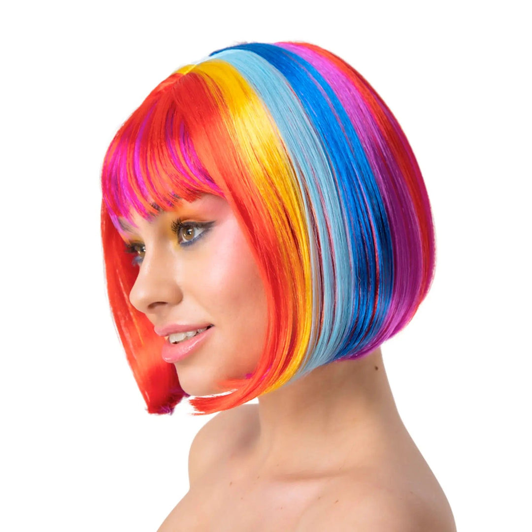 Lady wearing a rainbow coloured wig in a pageboy style bob with fringe for Pride festivals and fancy dress costumes