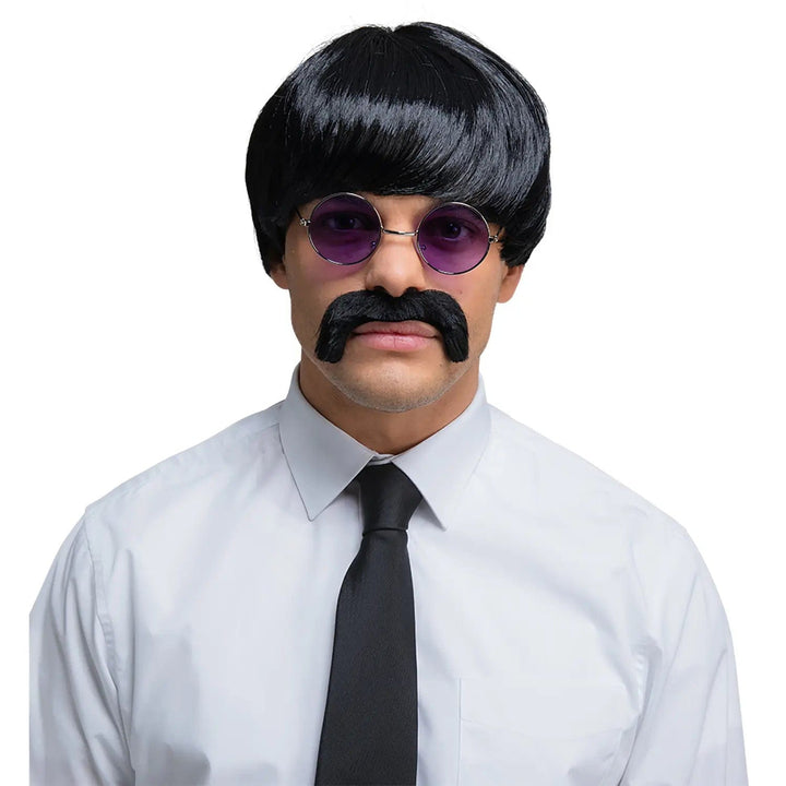 Man wearing a 60s pop icon black wig and moustache set and purple tinted glasses for Beatles fancy dress costumes