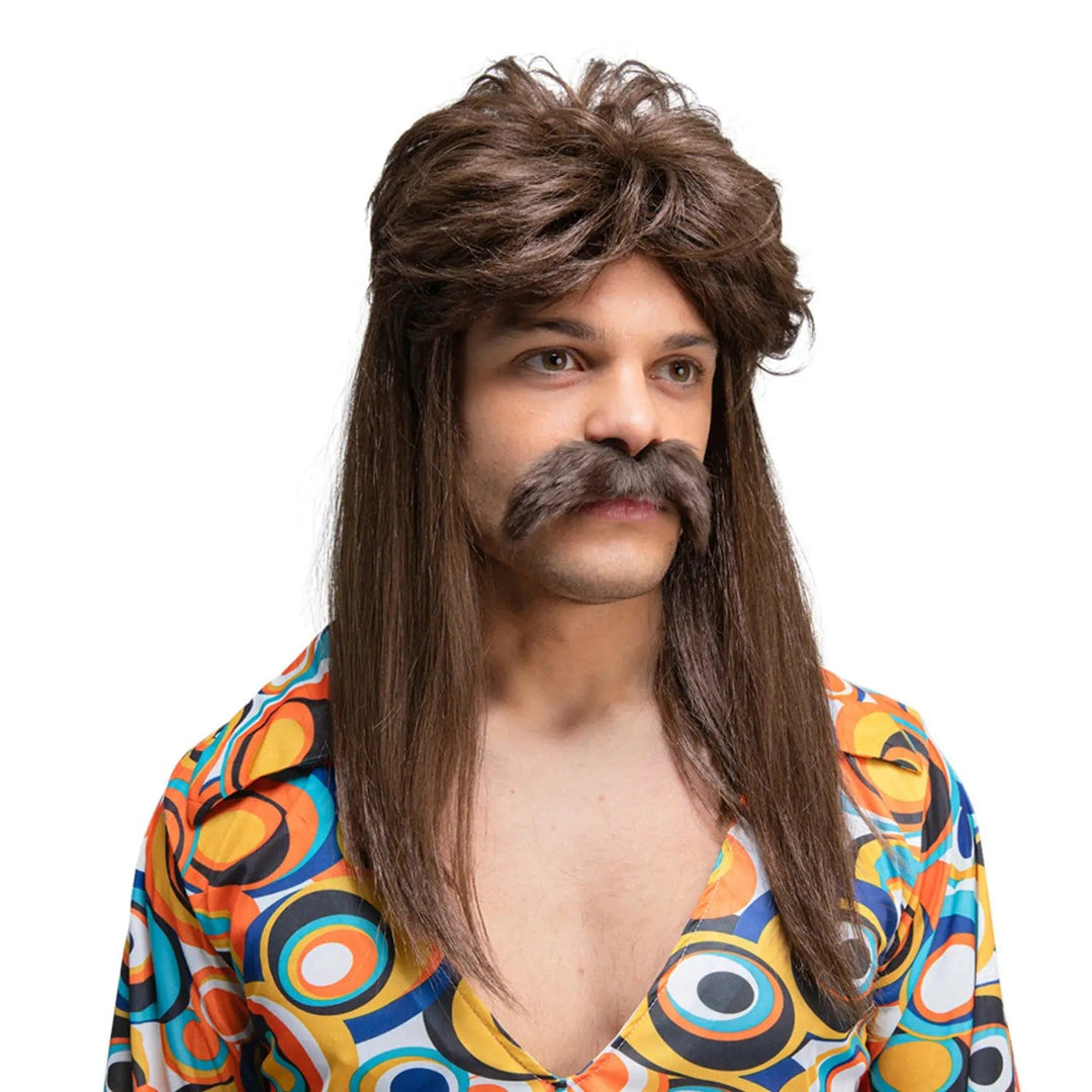 Man wearing a 70s bold pattern shirt and long brown mullet style wig and moustache