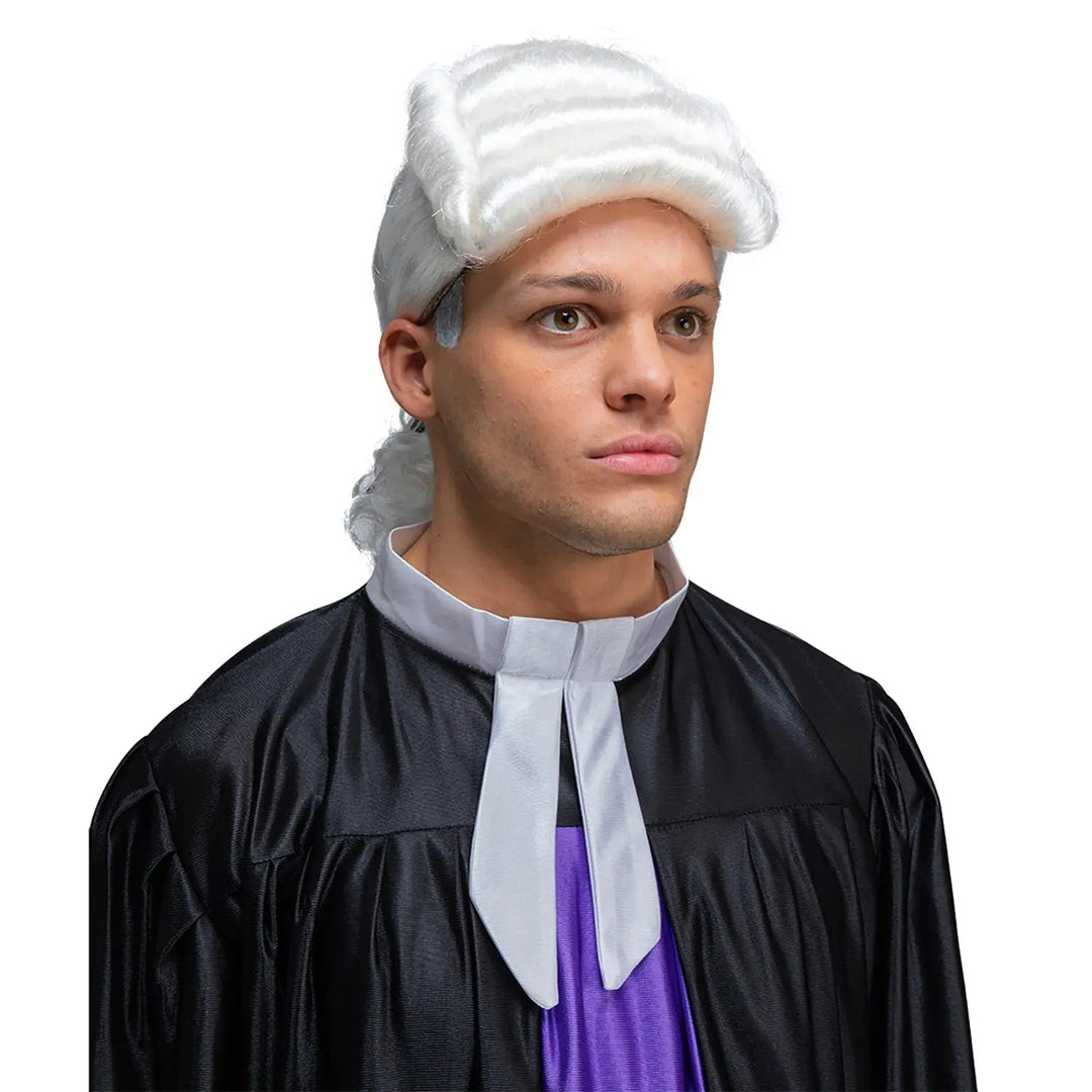 Man dressed as a judge with white powder wig and black cloak for fancy dress parties