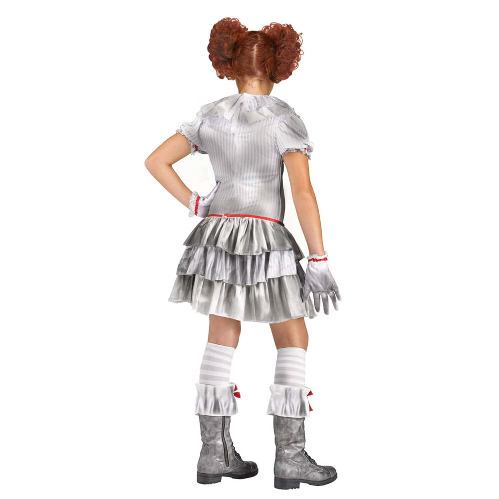 A child model shown from the back wearing a metallic silver costume with a ruffled short-sleeve top, tiered skirt, striped socks, gloves, and boots, against a plain white background.