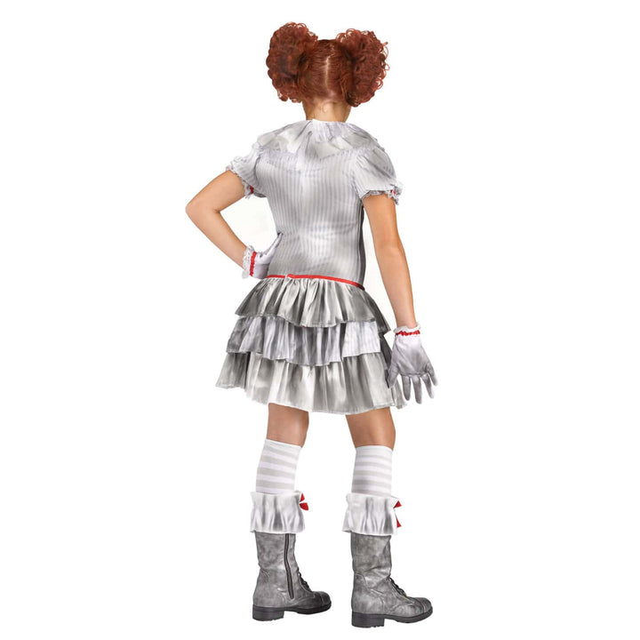 A child model shown from the back wearing a metallic silver costume with a ruffled short-sleeve top, tiered skirt, striped socks, gloves, and boots, against a plain white background.