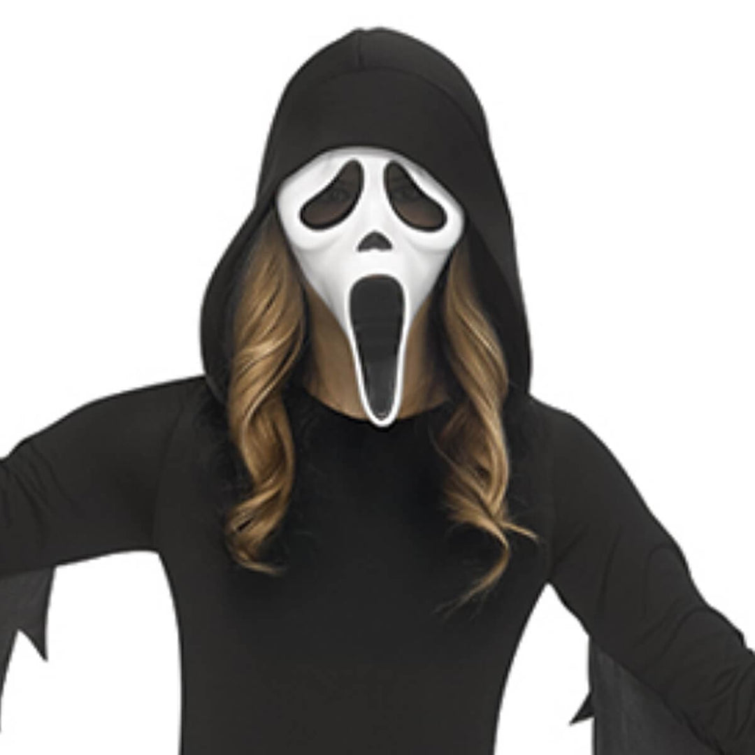 Young person wearing a white Ghost Face mask for Halloween