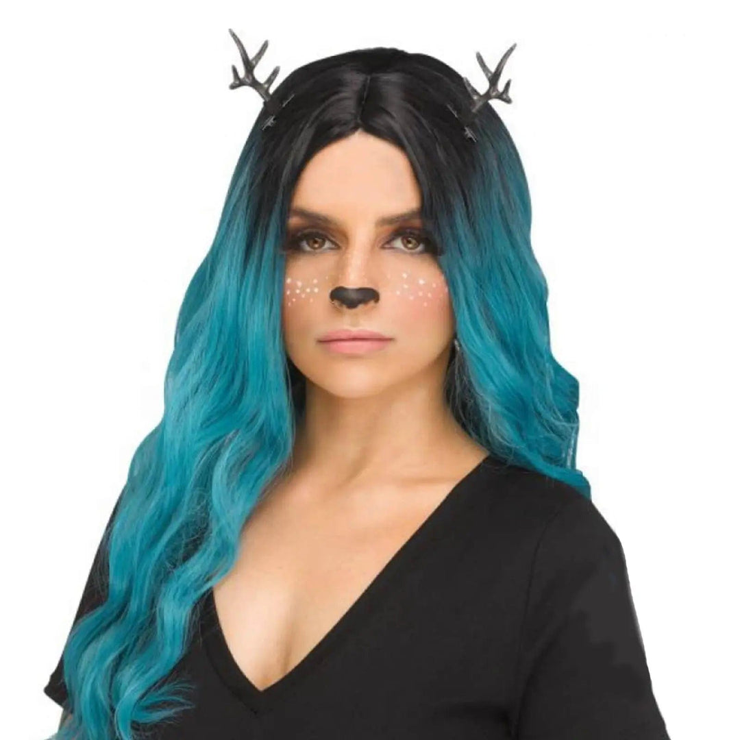 Lady wearing a blue and black wig with grey reindeer antlers