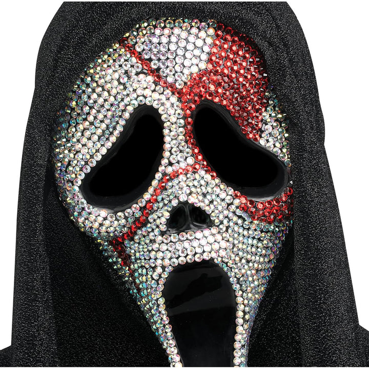 Close up of a Ghost Face mask with sparkling clear and red rhinestones and a black shimmering shroud
