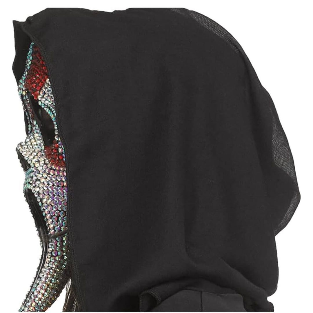 A close-up of a black hooded garment or mask with a heavily embellished side panel covered in iridescent rhinestones, shown against a plain white background.