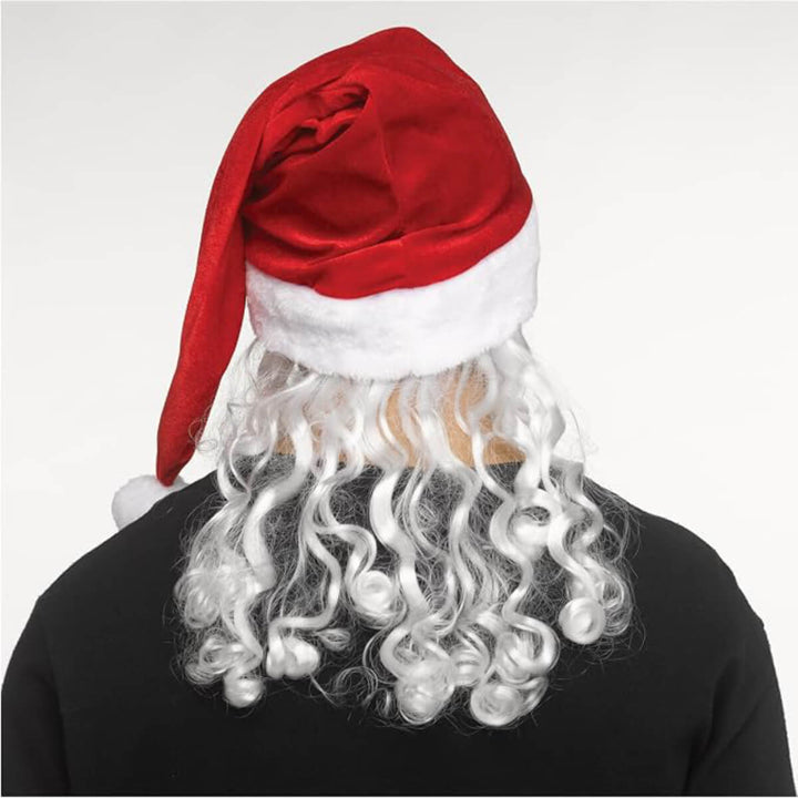 Back view of a person wearing a Santa hat and white wig on a plain background