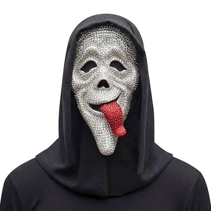 A hooded Scary Movie Waass-up! mask costume accessory covered in silver rhinestones with a red rhinestone tongue, worn by a model in a black hoodie against a white background.