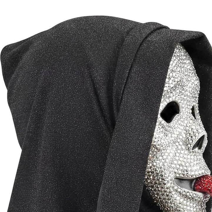 A close-up of a black hooded Scary Movie rhinestone-covered silver face mask partially visible, set against a plain white background.