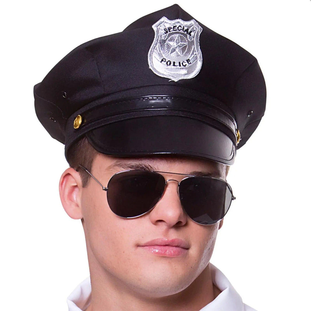 Man wearing a police hat and aviator shade sunglasses for fancy dress costumes