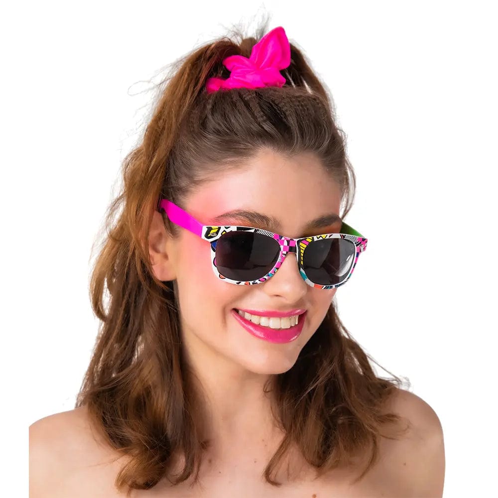 Model wearing a pair of cartoon style sunglasses with bright colours and wearing a neon pink headband