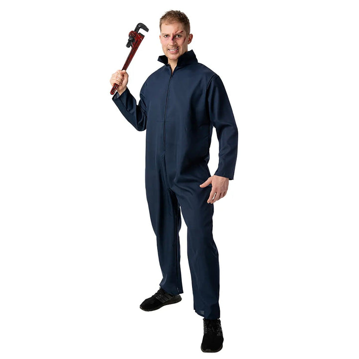 Man dressed in a blue boiler suit holding up a plastic pipe wrench prop for Halloween