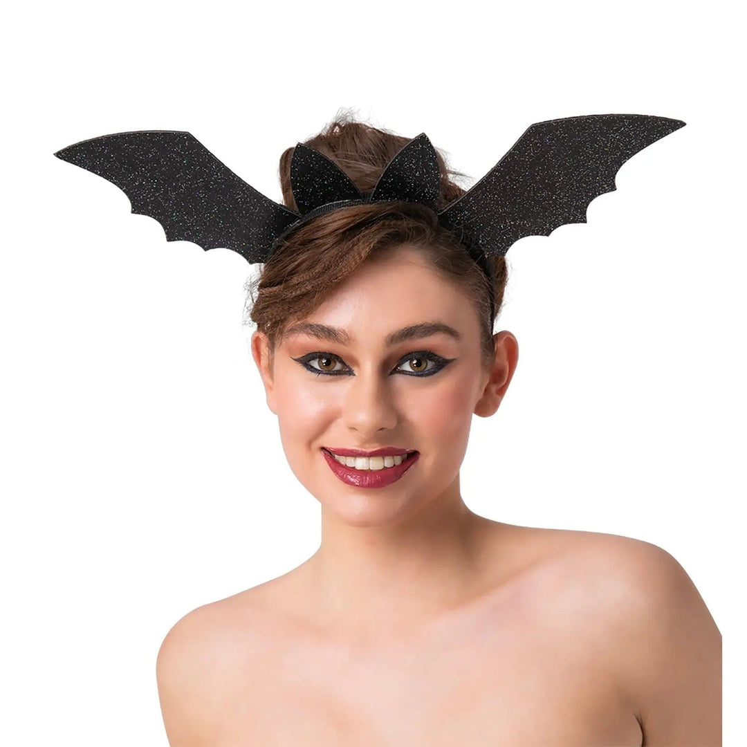 Lady wearing a black glitter bat wings headband for Halloween fancy dress costumes