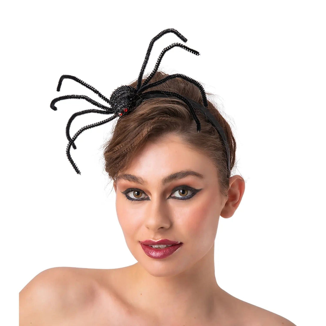 Lady wearing a large black spider headband with red jewel eyes and long legs for Halloween parties