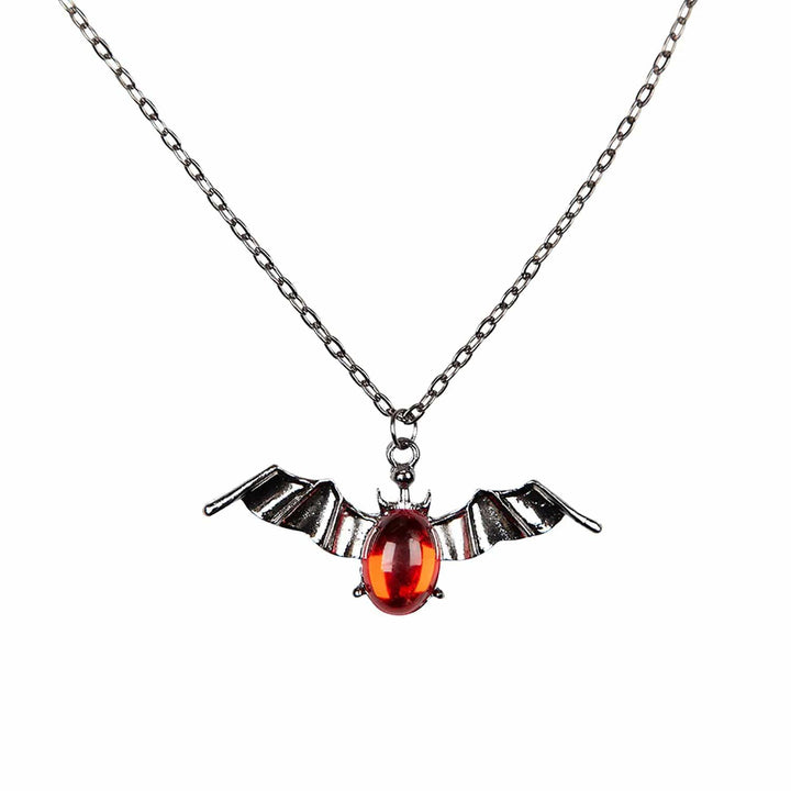 Vampiress bat pendant with silver wings and large red jewel body for Halloween costumes