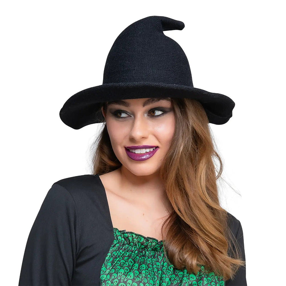 Lady wearing a black knitted fabric witch hat for Halloween