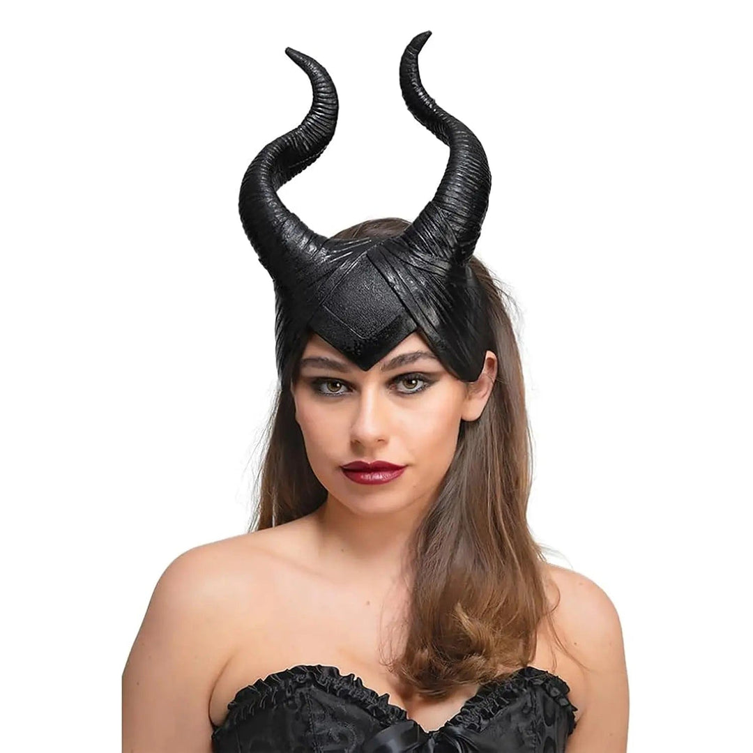 Woman wearing a set of large black gothic demon horns for Halloween fancy dress costumes