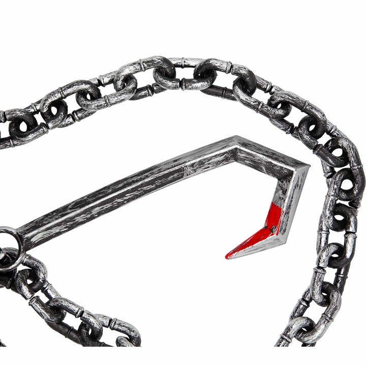 Close up of a plastic butcher's hook prop with fake blood