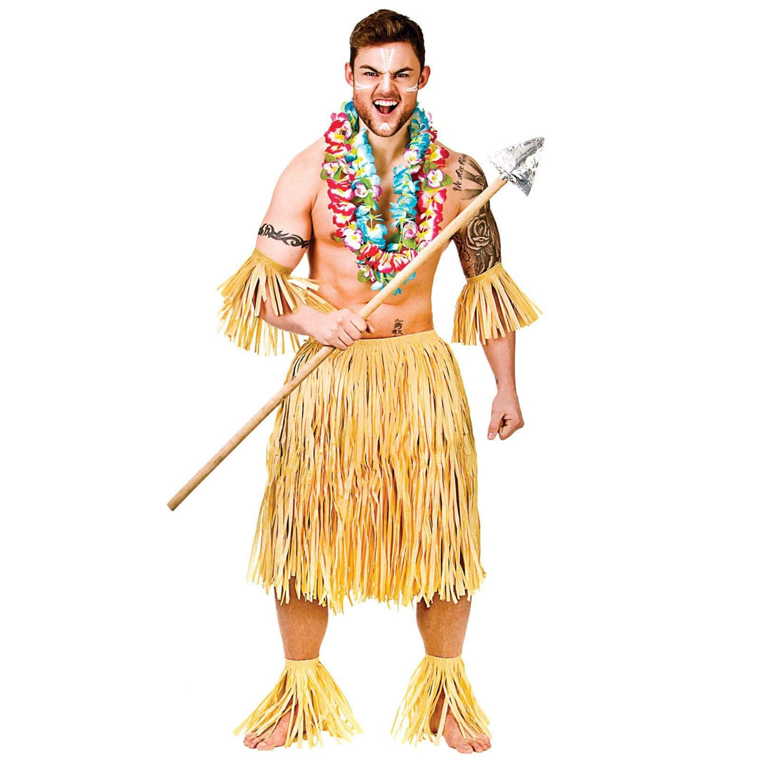 Man wearing a Hawaiian grass skirt and cuffs on wrists and ankles for fancy dress costumes