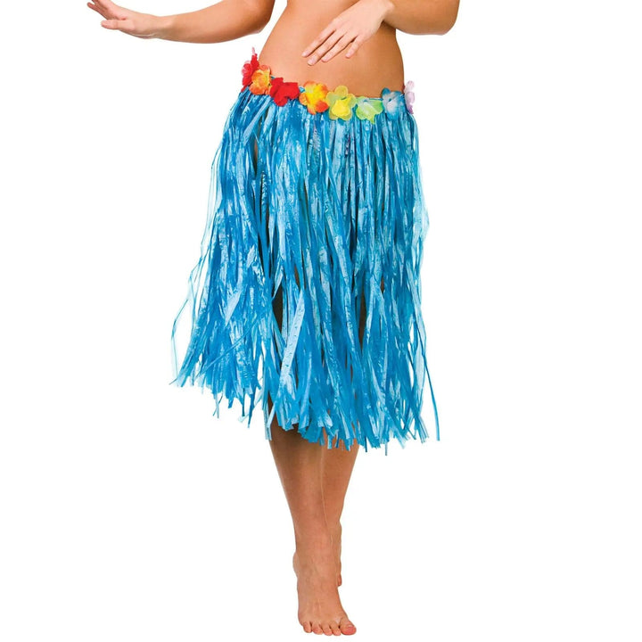 Woman wearing a bright blue Hawaiian hula skirt with flower waist band