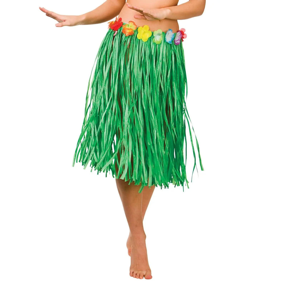 Lady wearing a bright green Hawaiian hula skirt with flower waist band