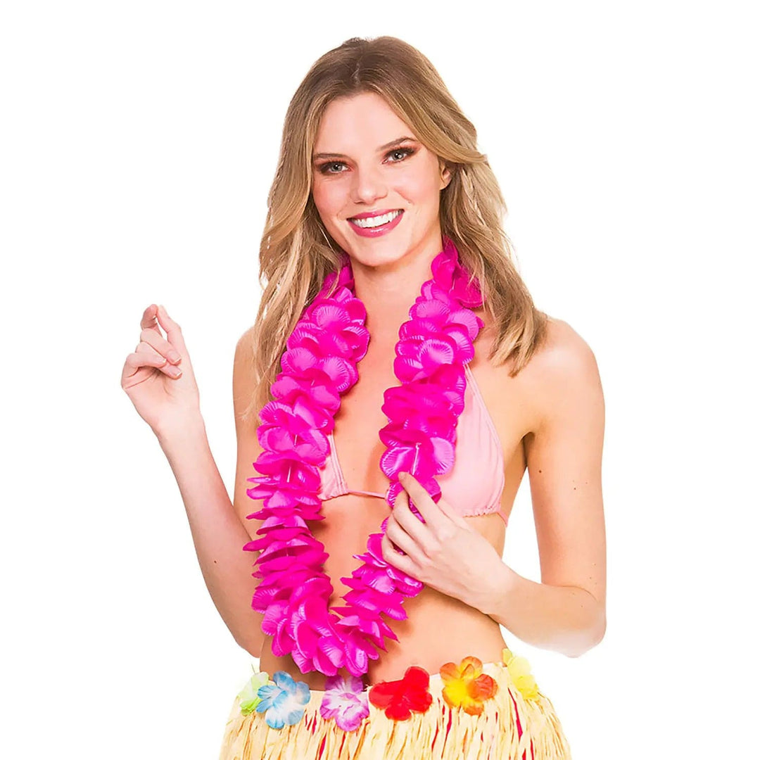 Woman wearing a hot pink flower Hawaiian lei floral garland for fancy dress and beach parties