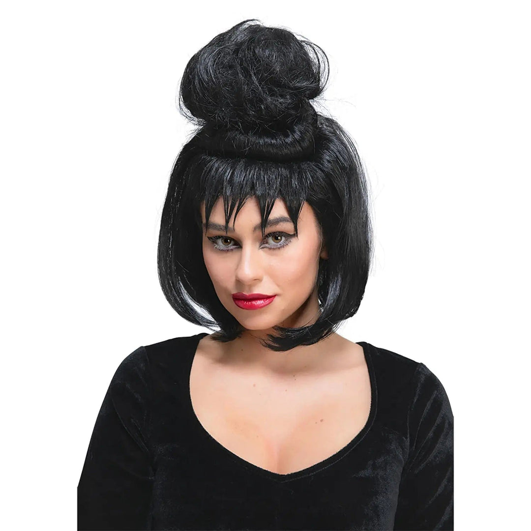 Lady wearing a black wig with bun on top and jagged fringe for Halloween and fancy dress costumes