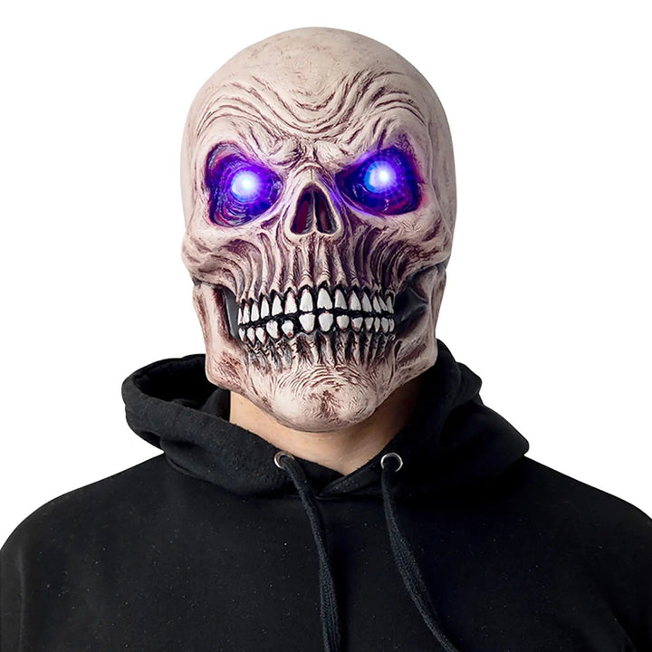 Model wearing a skull mask with blue light up eyes for Halloween skeleton fancy dress costumes